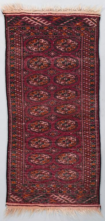 Three Afghan rugs. Ca 170x123 cm, 115x80 cm, and 117x57 cm.