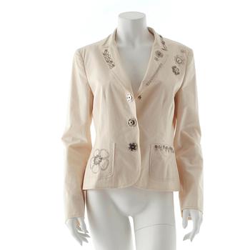 638. MOSCHINO cheap and chic, a creme colored cotton jacket.