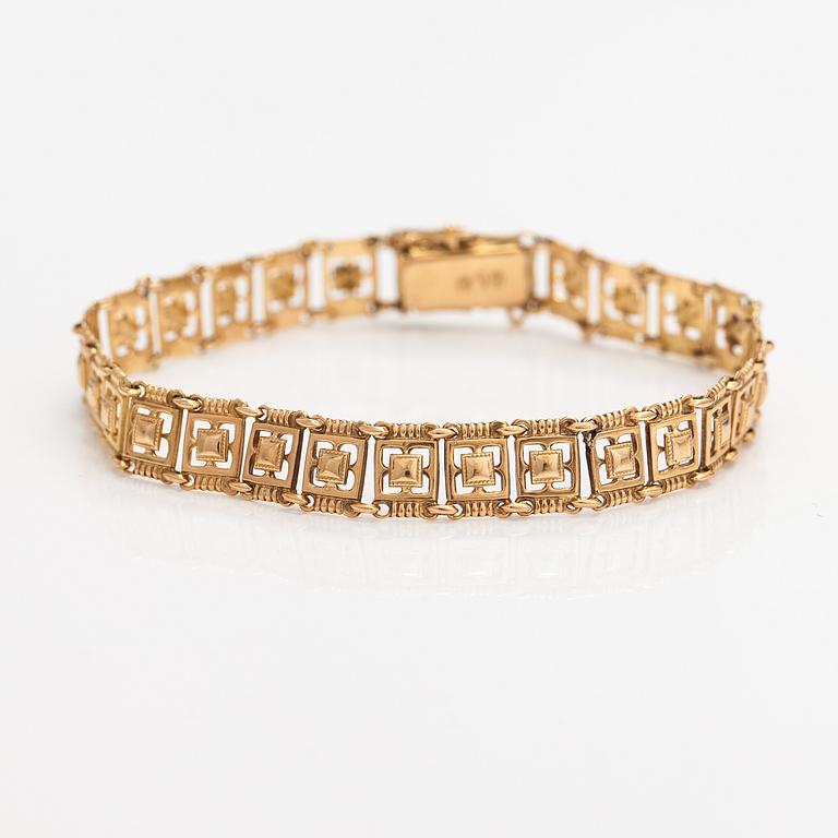 A 14K gold bracelet. Kallion kulta ja kello, Helsinki 1926.