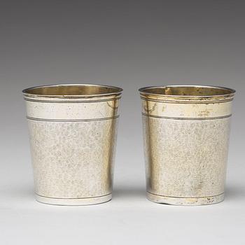 A matched pair of German 17th century parcel-gilt silver, Augsburg (1627-1665).