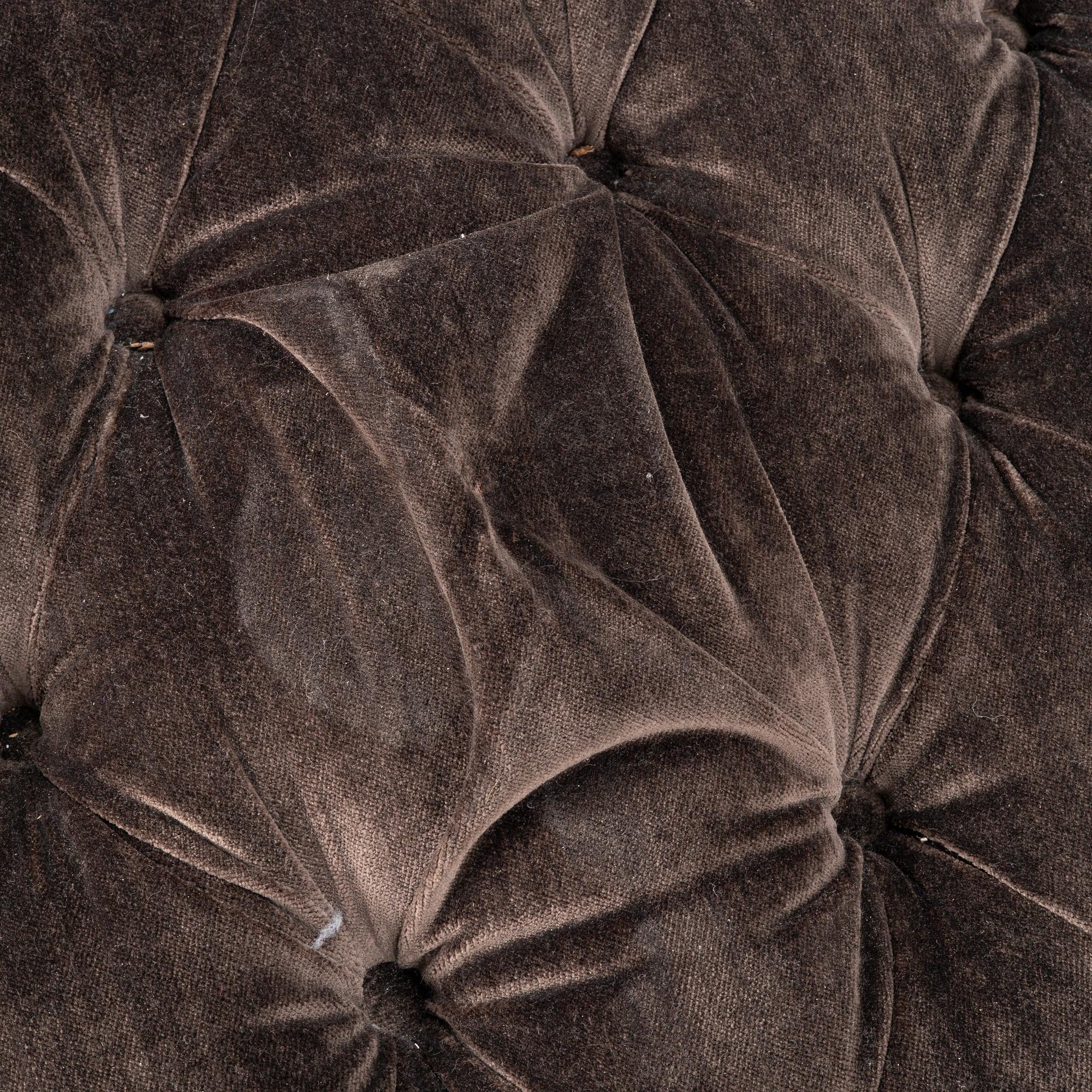 A pouf, contemporary.