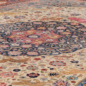 A CARPET, a semi-antique Tabriz, around 422 x 310 cm.
