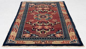 Carpet, antique China, approx. 128 x 67 cm.