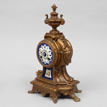 A Louis XVI-style mantel clock, circa 1900.