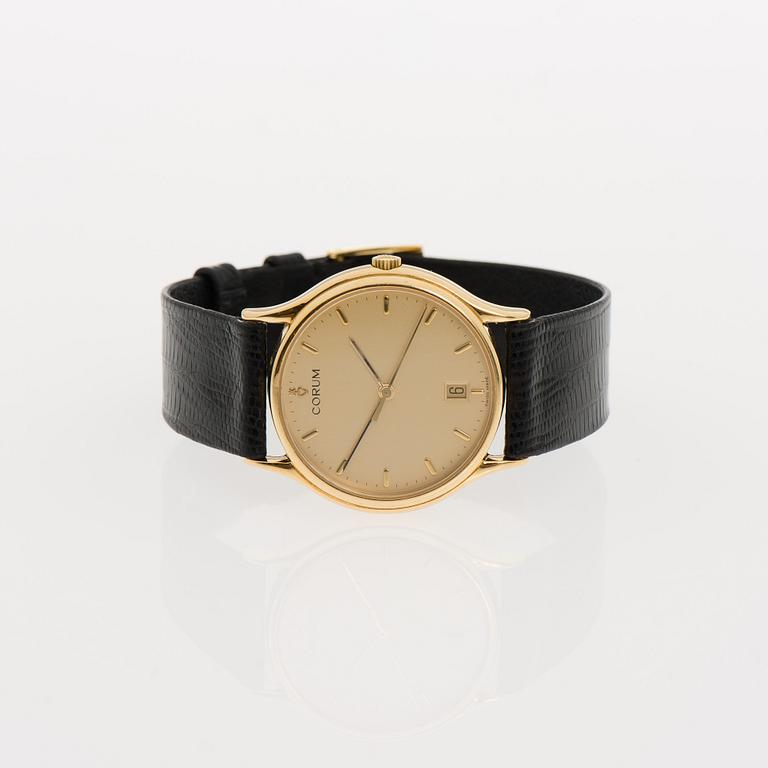 ARMBANDSUR, herr, Corum, 18K guld, original läderarmband. Garanti intyg 2007.