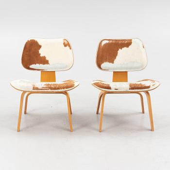 Charles & Ray Eames, a pair of 'Plywood Group DWC' chairs, Vitra.