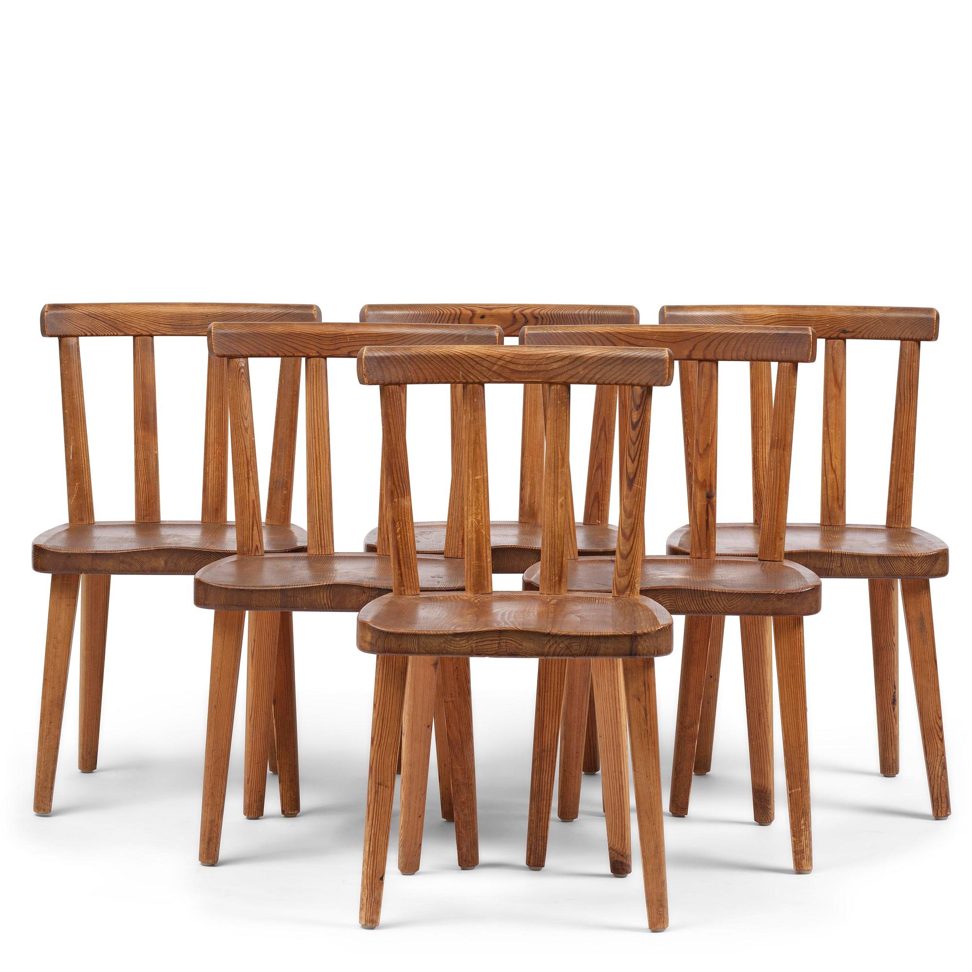 Axel Einar Hjorth, a set of six stained pine "Utö" chairs, Nordiska Kompaniet, Sweden, 1930s.