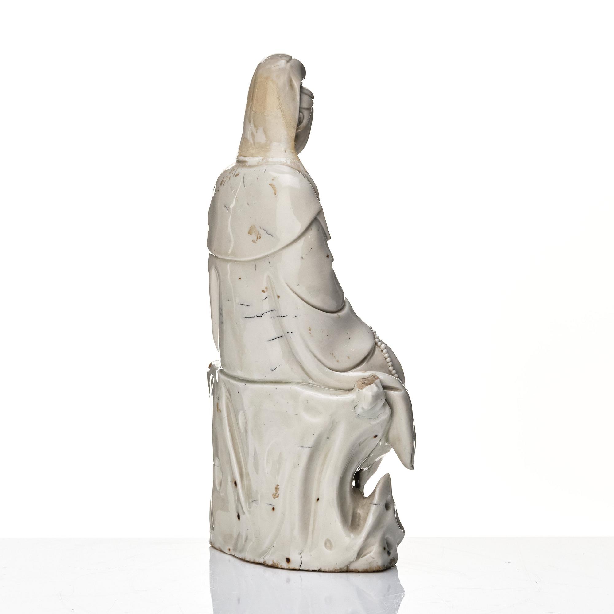 A Chinese blanc de chine figure of Guanyin, Qing dynasty, 18th Century.