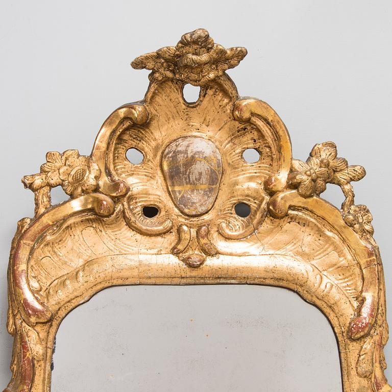 A Rococo mirror, Stockholm hallmark, latter part of the 18th century.