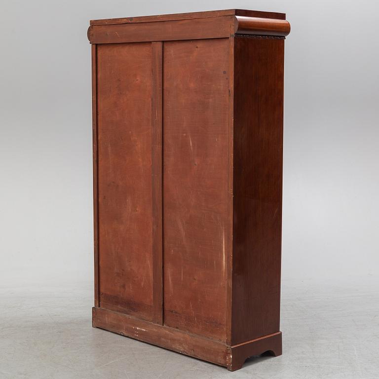 A first half of the 20th century mahogany veneered display cabinet.