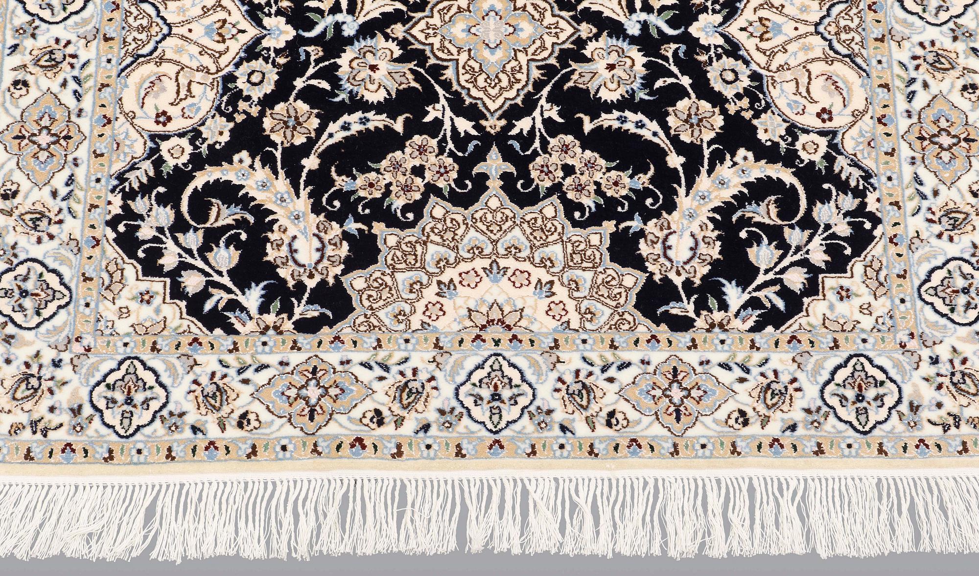 A Nain runner carpet, part silk Sk 6LAA, 337 x 103 cm.