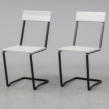 A pair of Grythyttan garden chairs.