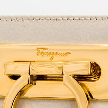 Salvatore Ferragamo, a leather “Gancini”bag.