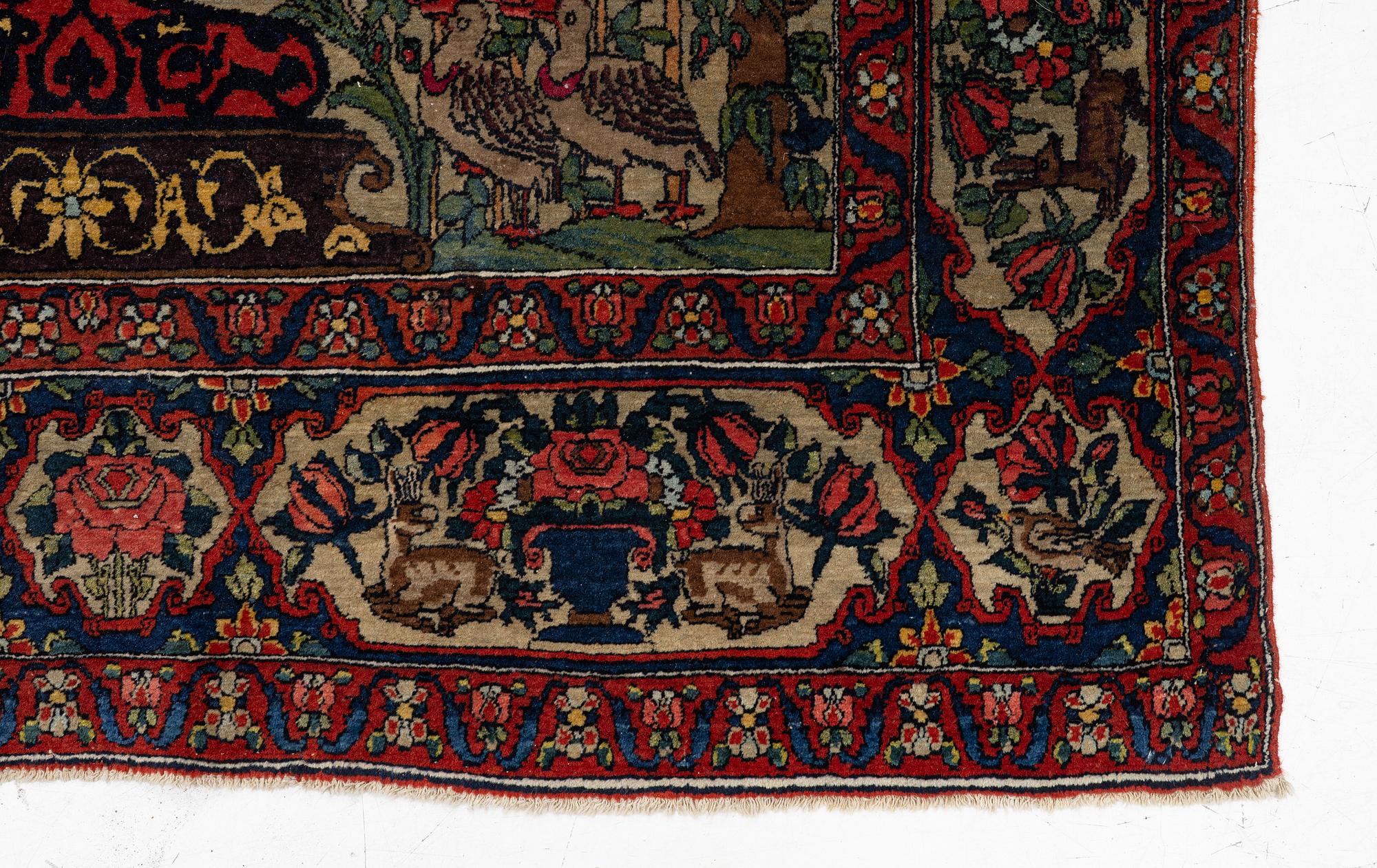 A figural oriental rug, c.. 230 x 130 cm.
