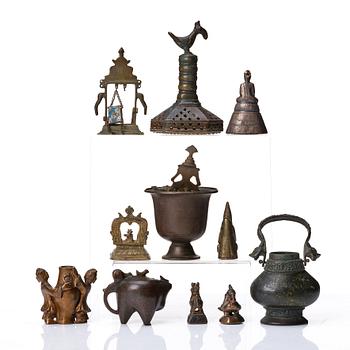 A small collection of bronzes, China, Burma and India. (11 pieces).