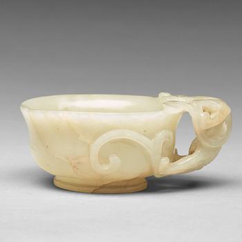 A carved nephrite Qilong goblet, Qing dynasty (1644-1912).