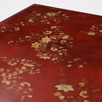 A Chinese red low table, 20th century.