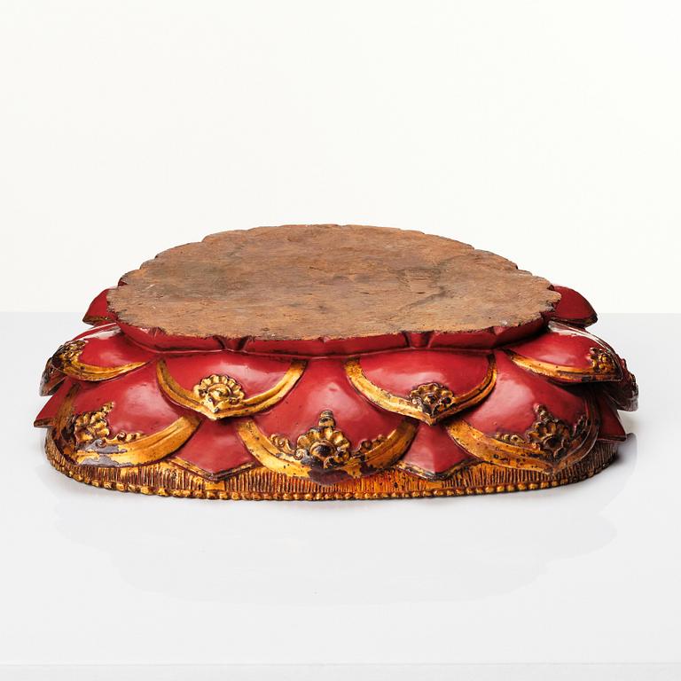 A large gilt and lacquered figure of a seated buddha, Qing dynasty, 19th Century.