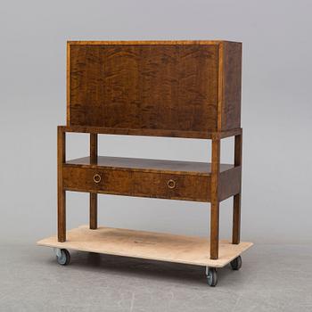 a mid 20th century birch bureau from Axel Larson, Bodafors, model number 954.