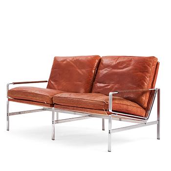 537. Preben Fabricius & Jørgen Kastholm, a two-seated brown leather sofa, Kill International, Germany 1960s.