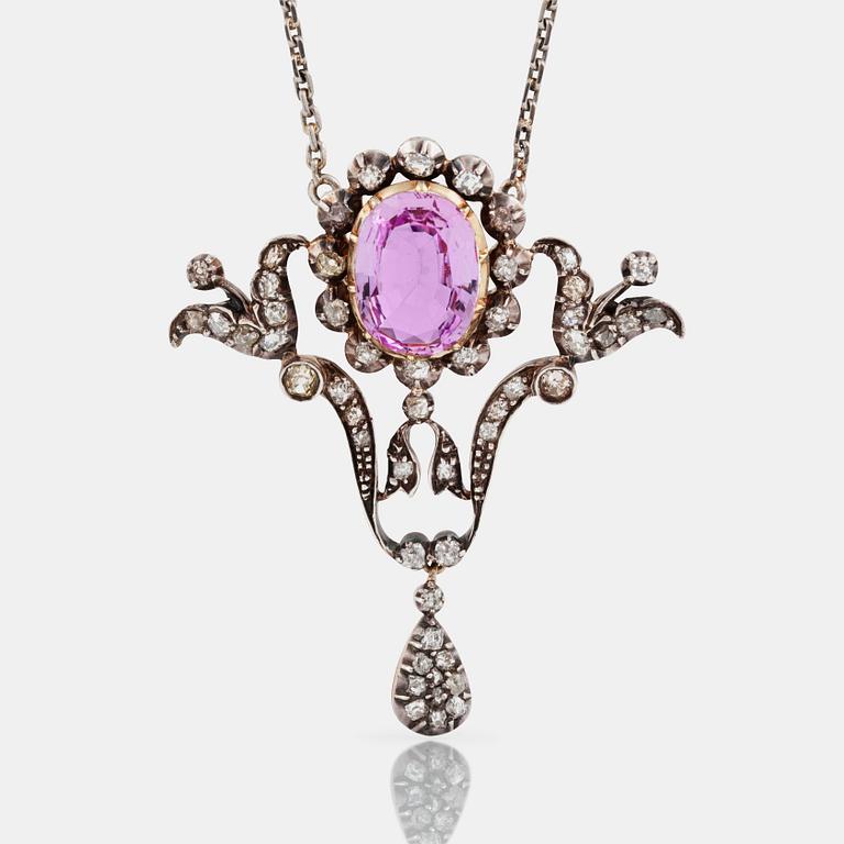 A Victorian old-cut diamond and pink topaz, circa 10.00 ct, pendant. Circa 1880.