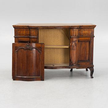 A Central-European 'kneehole' desk, 19th century.