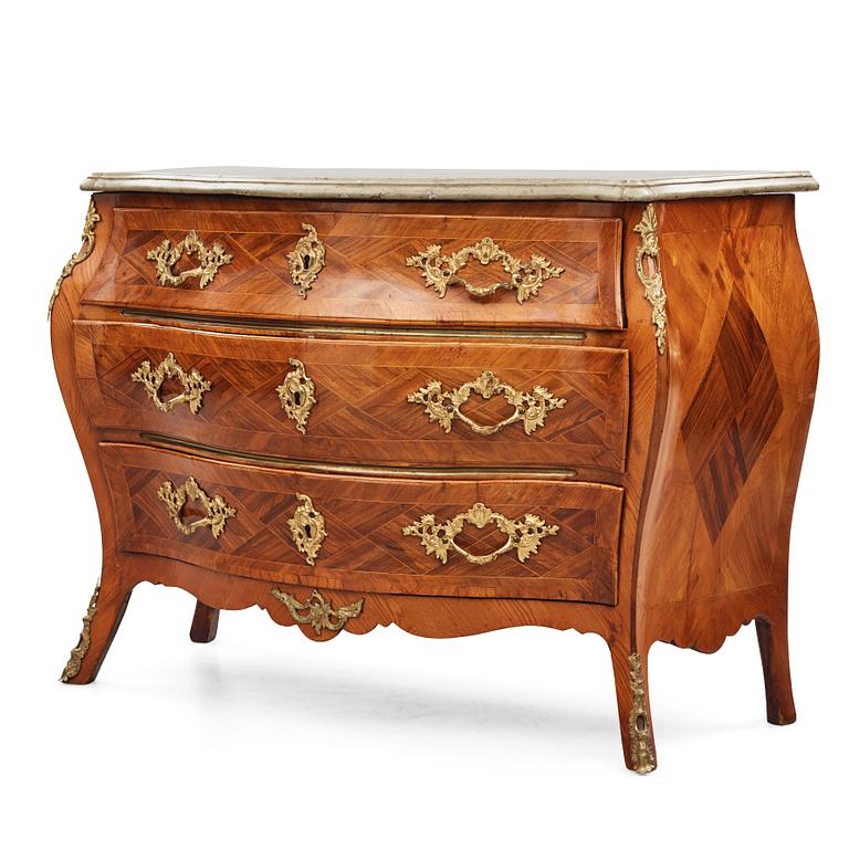 A Swedish rococo rosewood and gilt brass-mounted commode, later part of the 18th century.