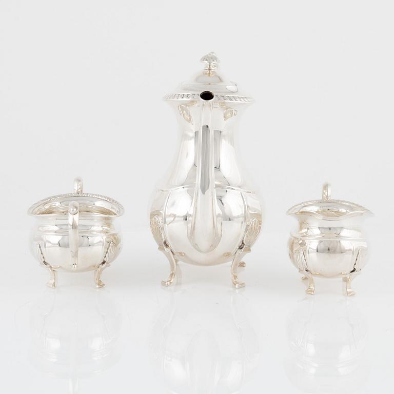 A Norwegian Silver Coffee Pot, Creamer and Sugar Bowl, mark of David Andersen, Oslo, mid-20th Century.