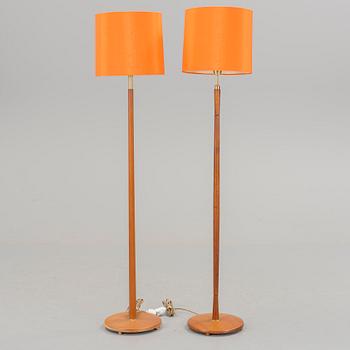 Two floor lamps in teak and brass from the 1960s/70s.