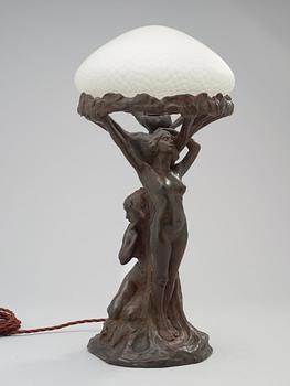 An Alice Nordin Art Nouveau patinated bronze table lamp, Herman Bergman, Stockholm.