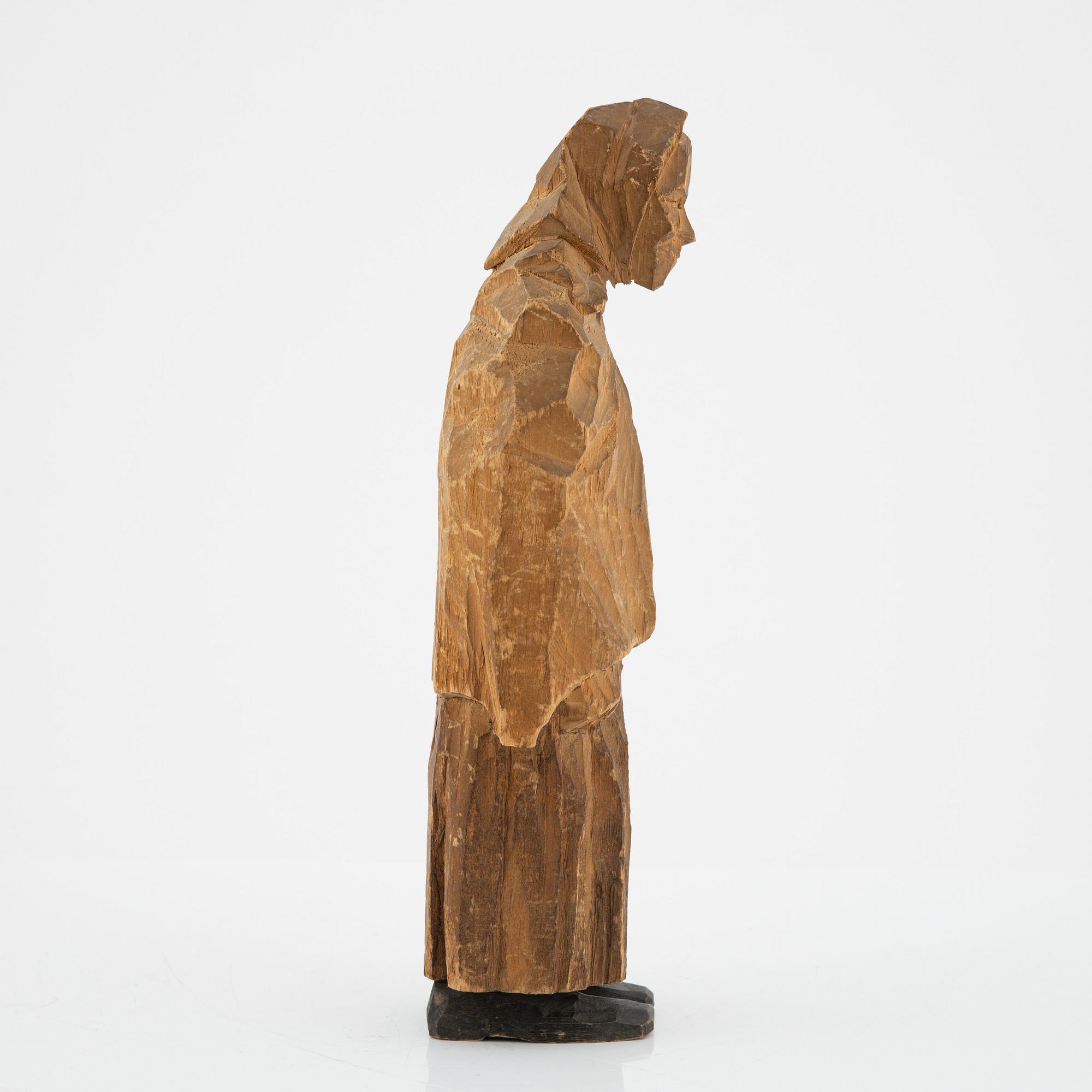 Axel Petersson Döderhultarn, skulptur, signerad. Delvis bemålat trä, höjd 25 cm.