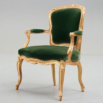 A Louis XV mid 18th century armchair.