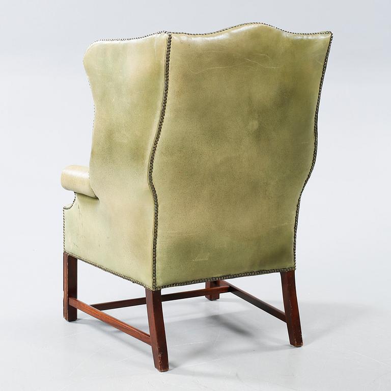 An english style armchair, second half of the 20th century.