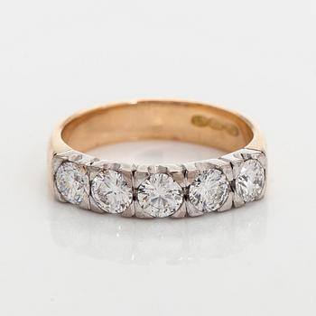 Ring, brilliant cut diamonds, 18K gold, Kultasepät Andreasen 2006.