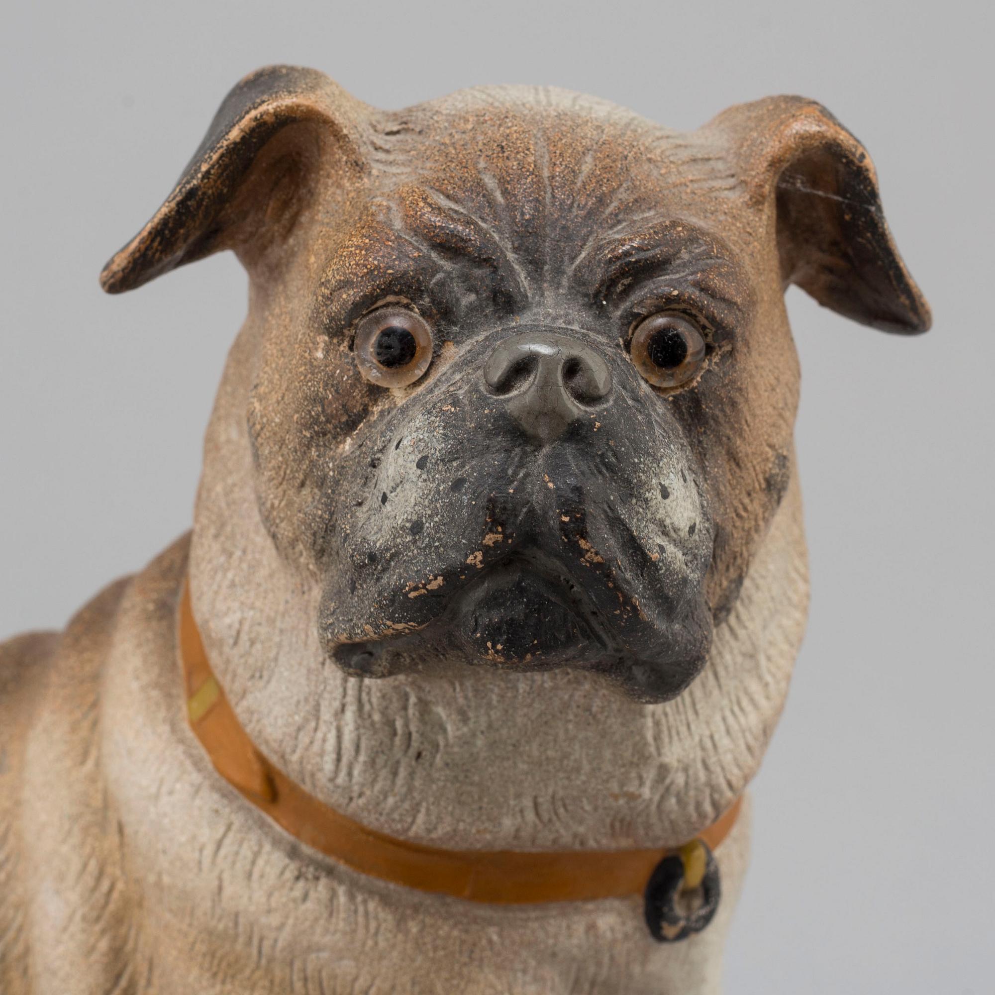 An early 20th century terracotta dog.