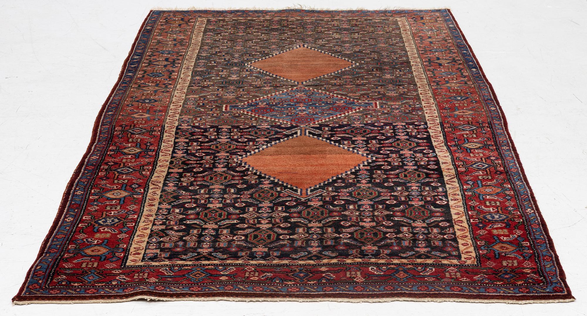 A semi-antique Bidjar rug, c. 255 x 135 cm.