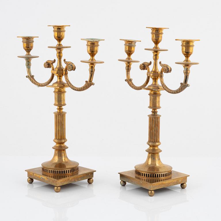 A pair of brass candelabras, GusumsBruk No 21.