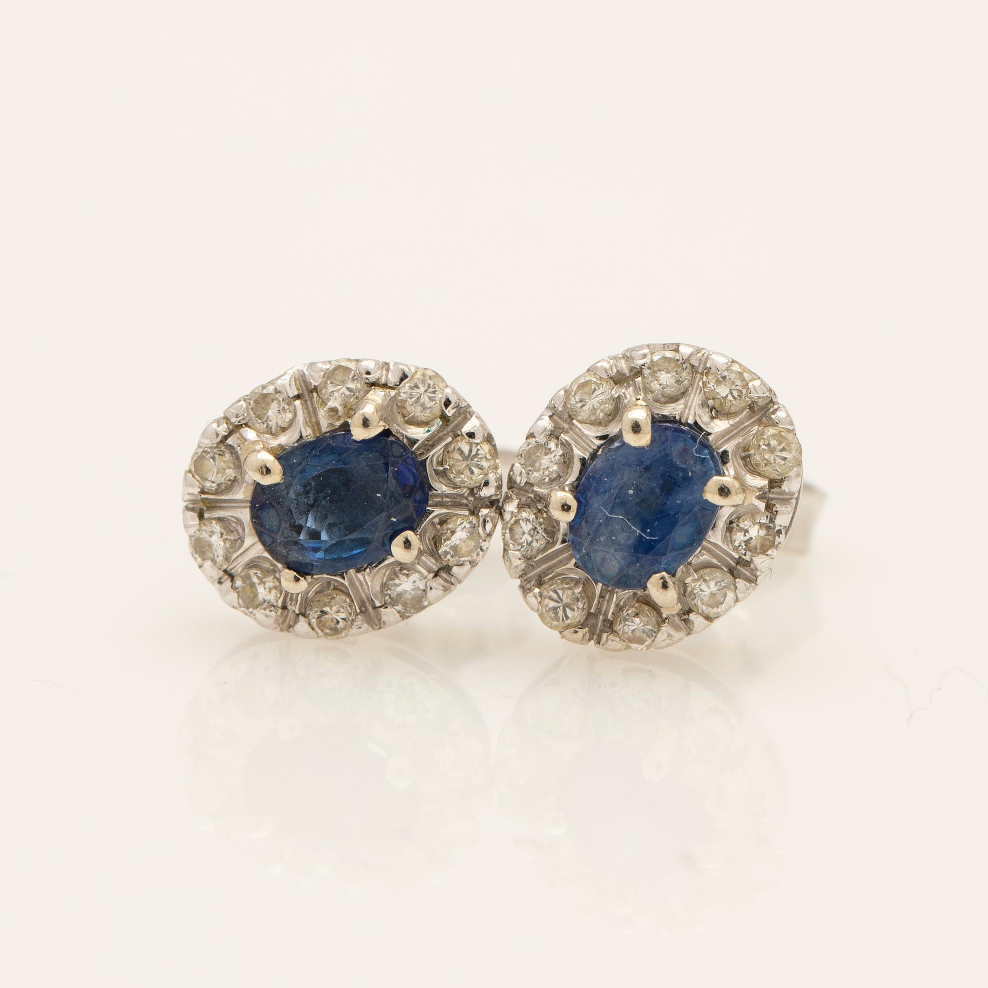 Earrings, a pair, 18k white gold with brilliant-cut diamonds and sapphire.