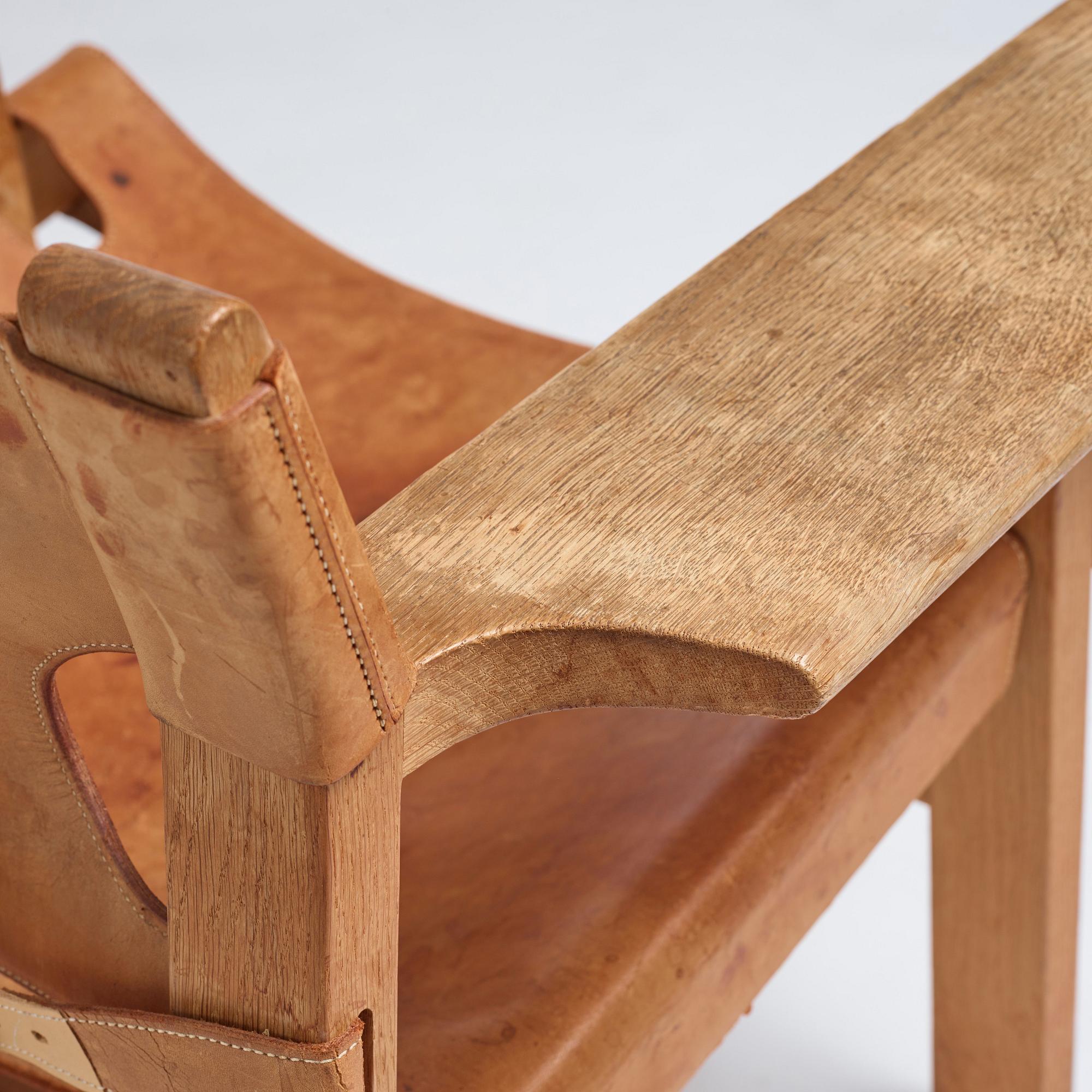 Børge Mogensen, a pair of oak and natural leather "Spanish Chair", model 226, Fredericia Stolefabrik, Denmark.