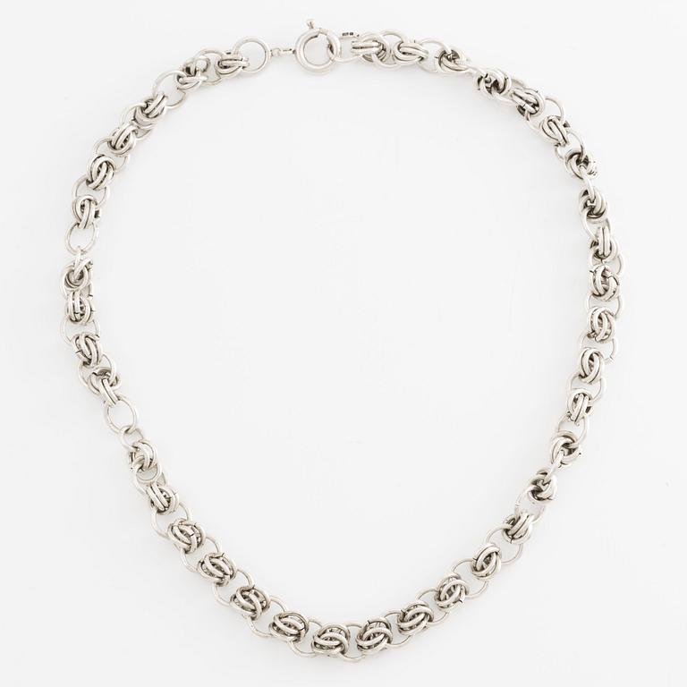 Silver necklace.