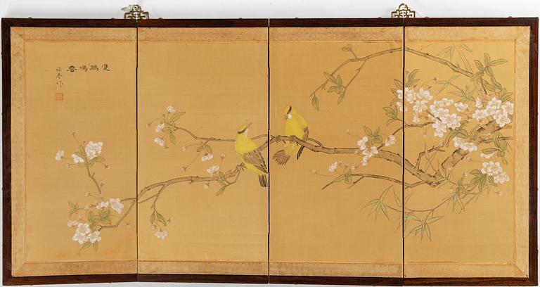 A Chinese folding screen, 20th century.