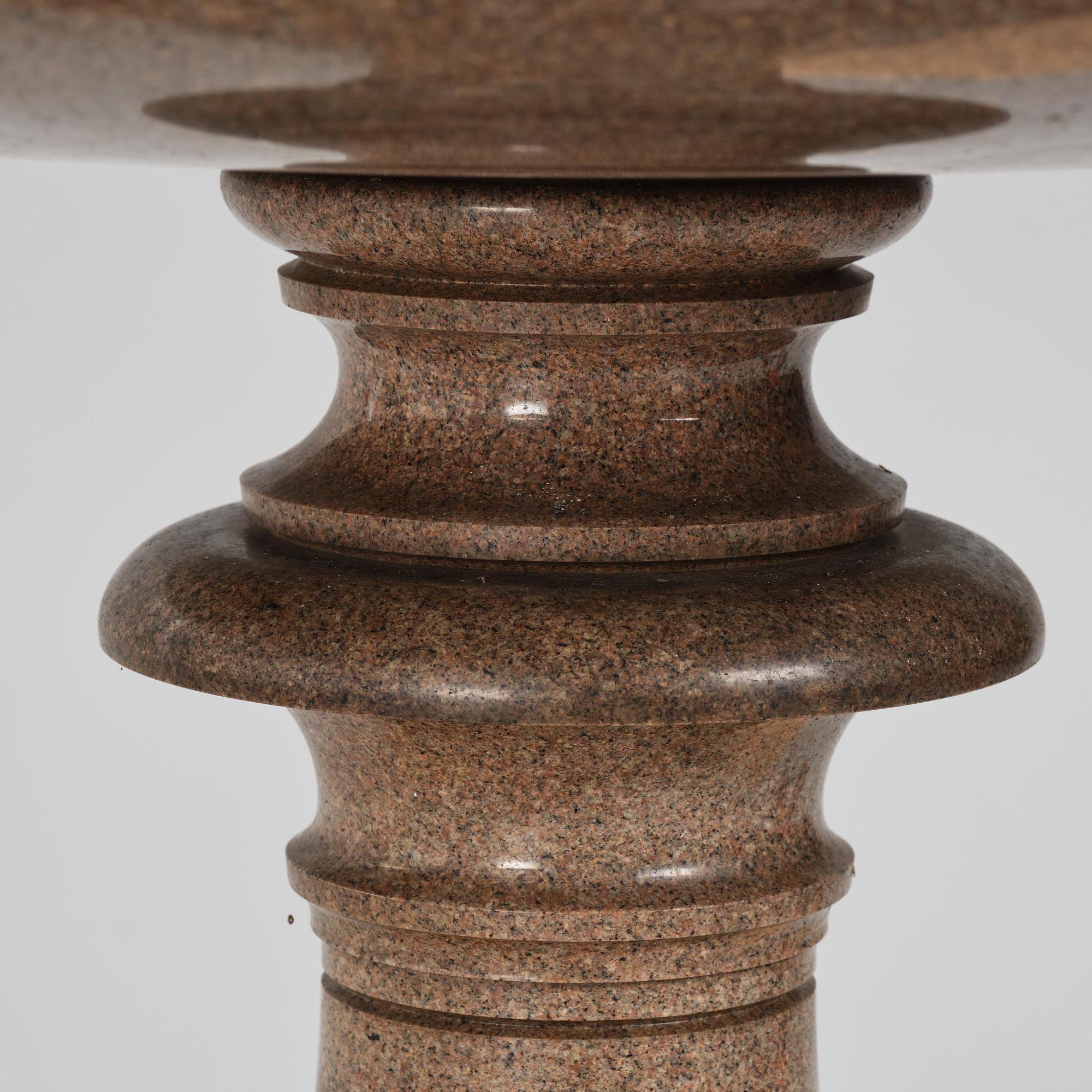 A massive Gardenurn, red Bohus granite, made circa 1905. Empire style.