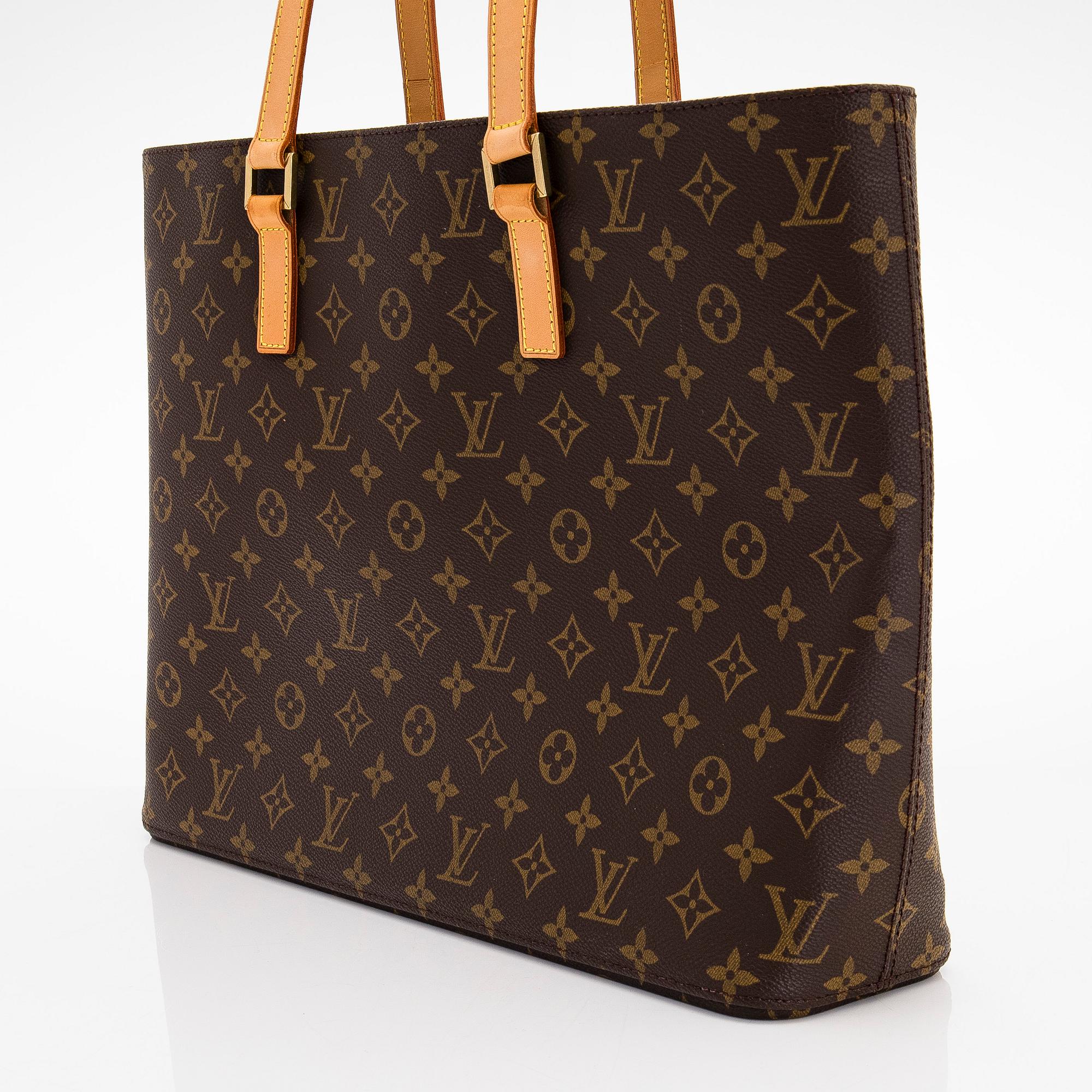 Louis Vuitton, a Monogram Canvas 'Luco' bag.