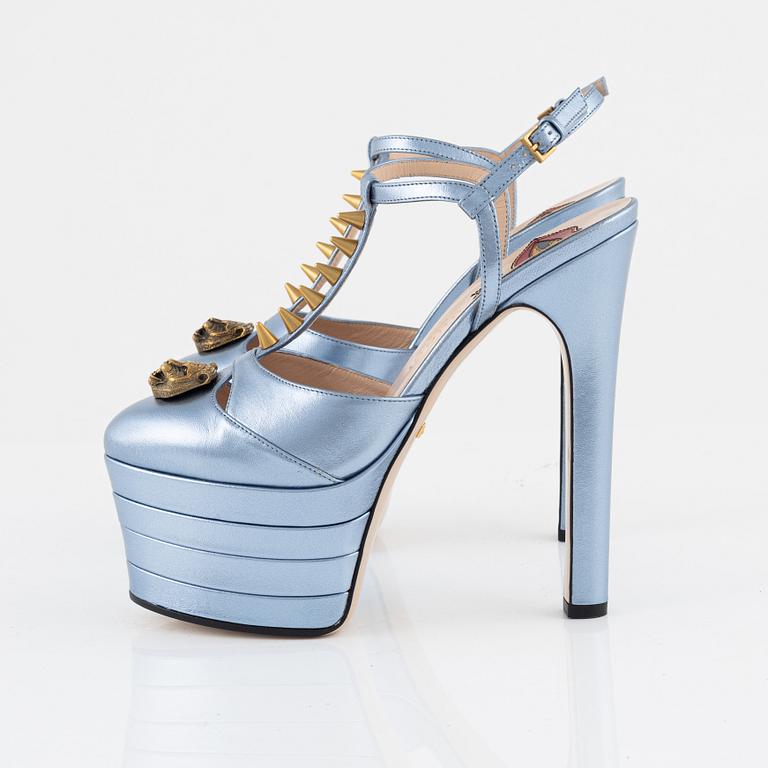 Gucci, a pair of baby blue metalic leather high heel shoes, 2016, size 37.