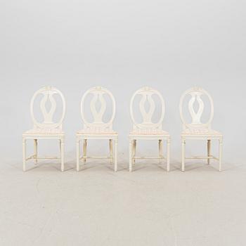 A late 20th century painted Gustavian style 5 pcs dining suit.
