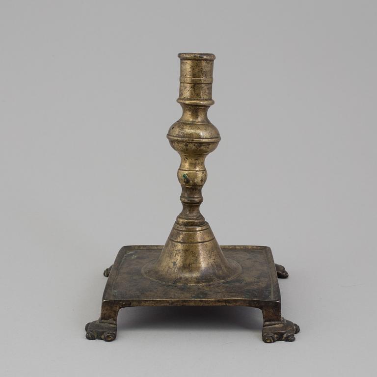 A BRONZE  CANDLESTICK, 17th century.