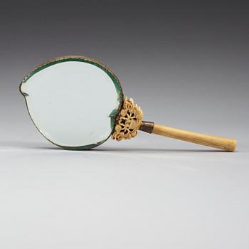 A Chinese enamel and ivory hand mirror, early 20th Centruy.
