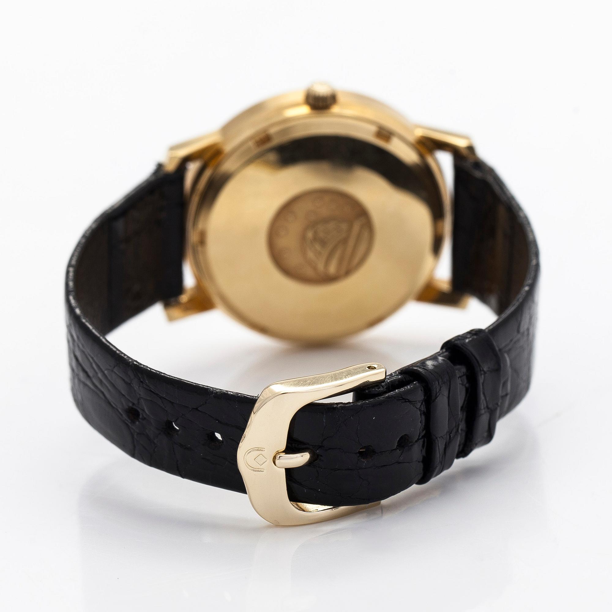 Omega, Constellation Day-Date, rannekello, 34 mm.