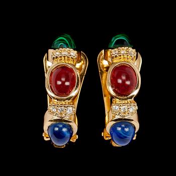 A set of two earclips by Christian Dior.