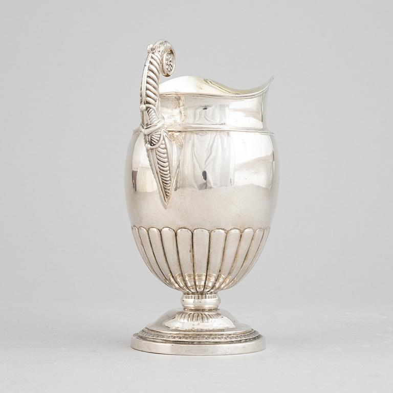 A Swedish empire parcel gilt silver creamer, mark of Anders Lundqvist, Stockholm 1828.